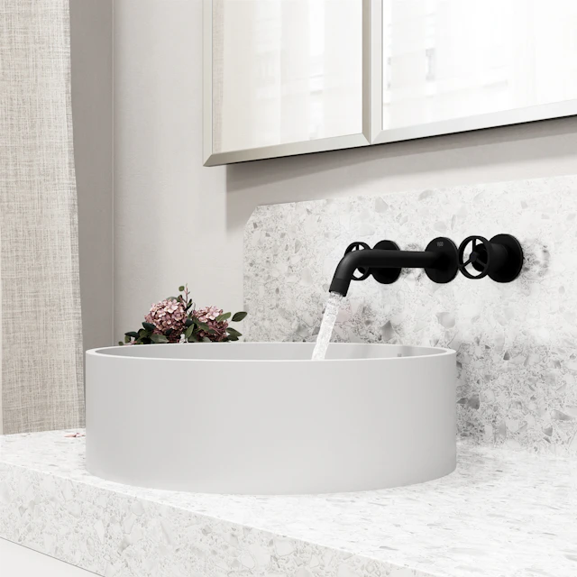 Matte Stone Anvil Composite Round Vessel Bathroom Sink in White with Wall-Mount Faucet and Pop-Up Drain - angle 3 - other