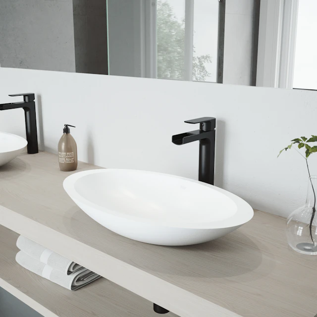 Matte Stone Wisteria Composite Oval Vessel Bathroom Sink in White with Amada Faucet and Pop-Up Drain - angle 3 - other